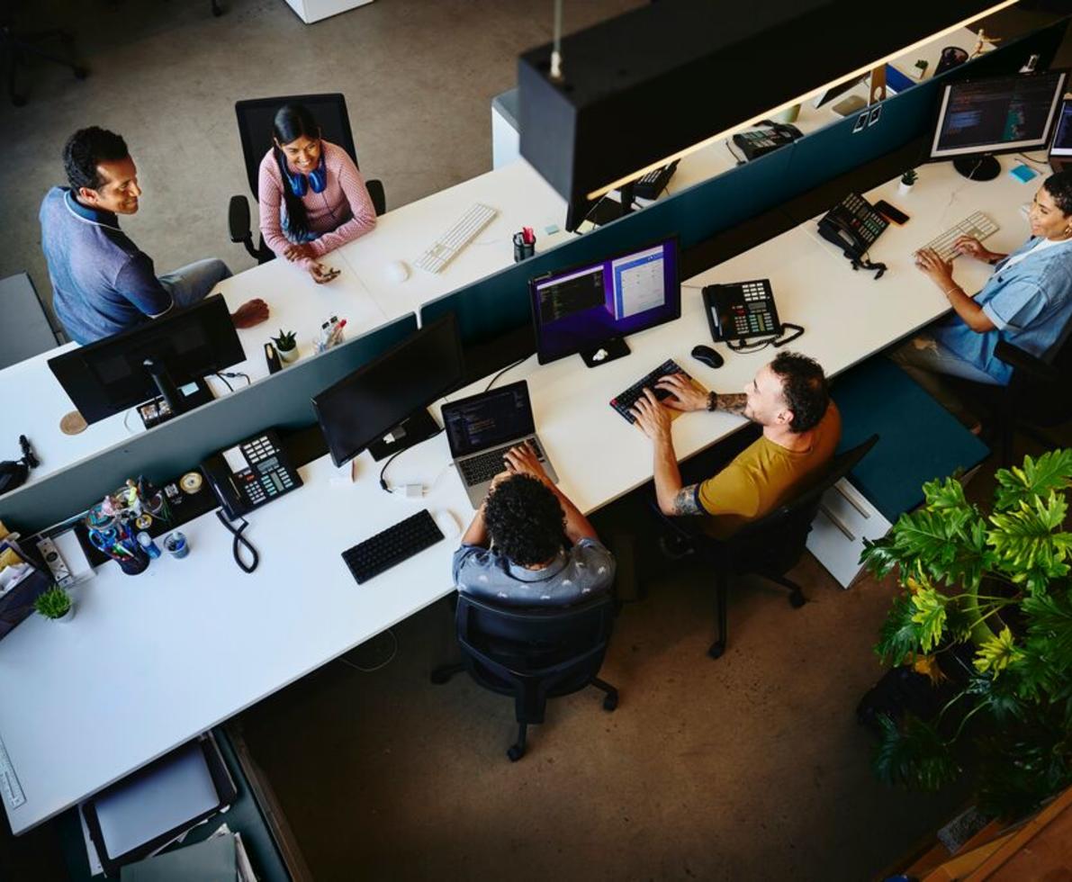 group sitting at desk working